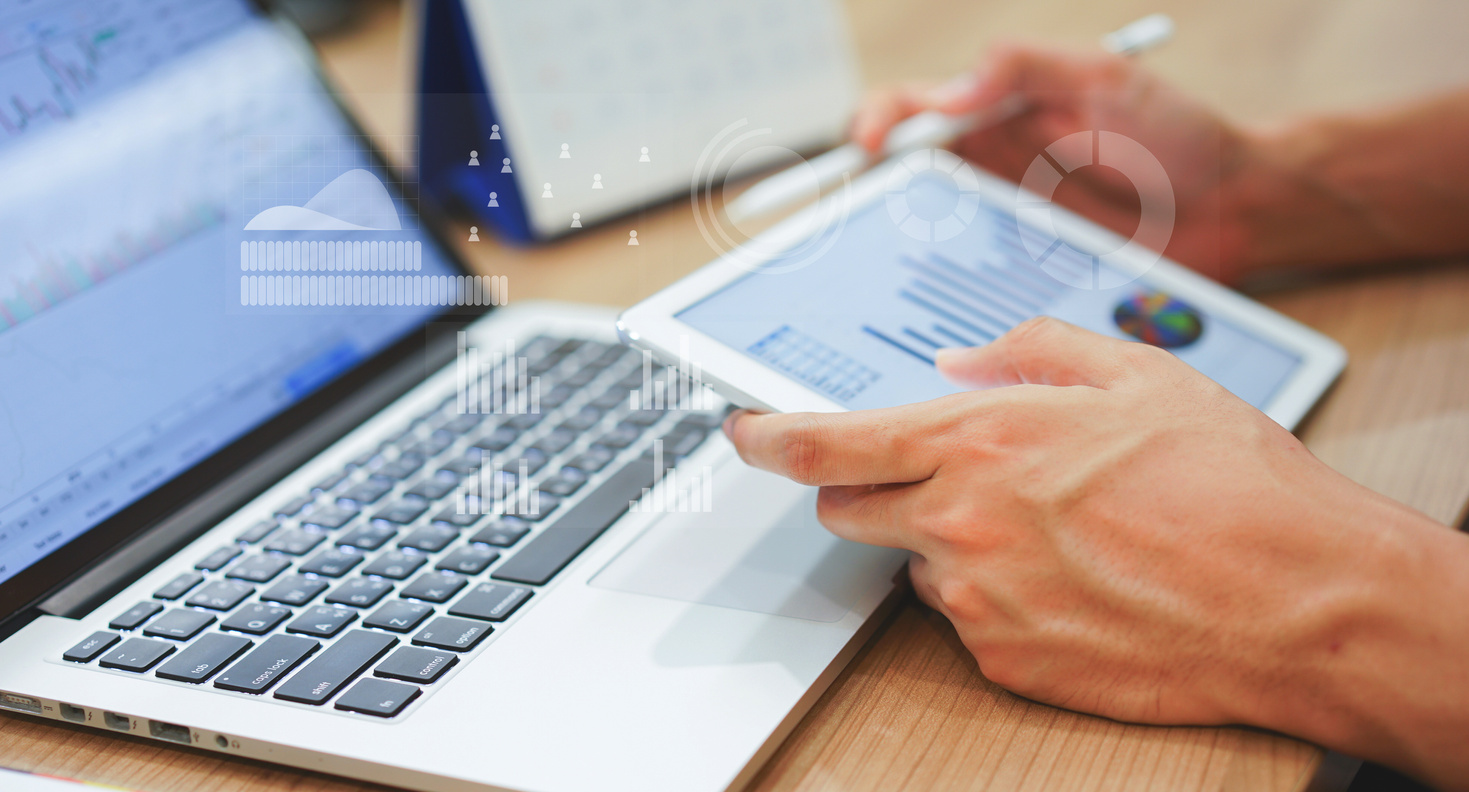 Close up business man hand hold tablet for thinking about stock market graph trading with statistic chart infographic concept